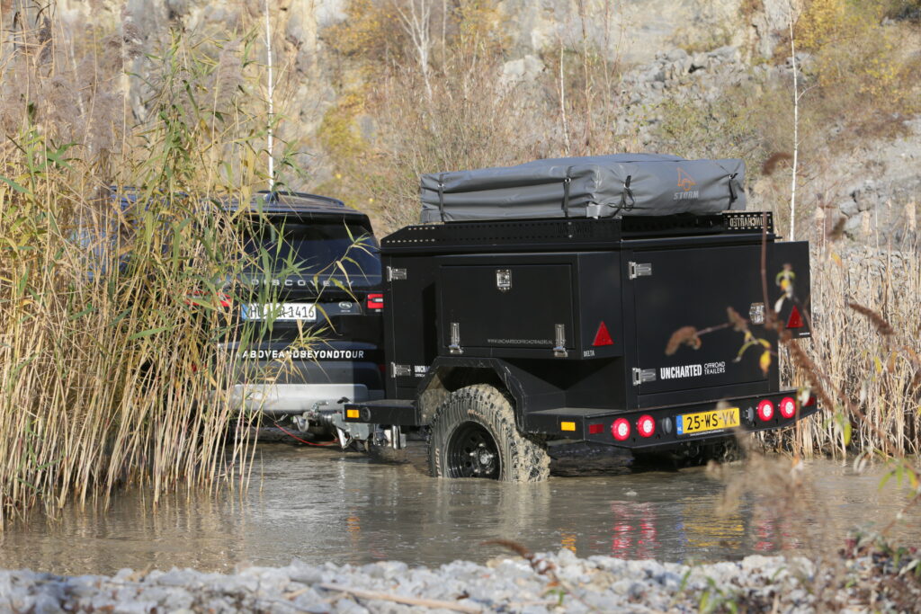 Offroad Trailing is driven through river